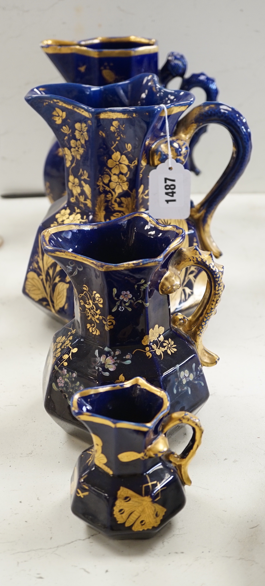 Four various Mason's ironstone hydra-shaped jugs, first half 19th century, tallest 25cm high